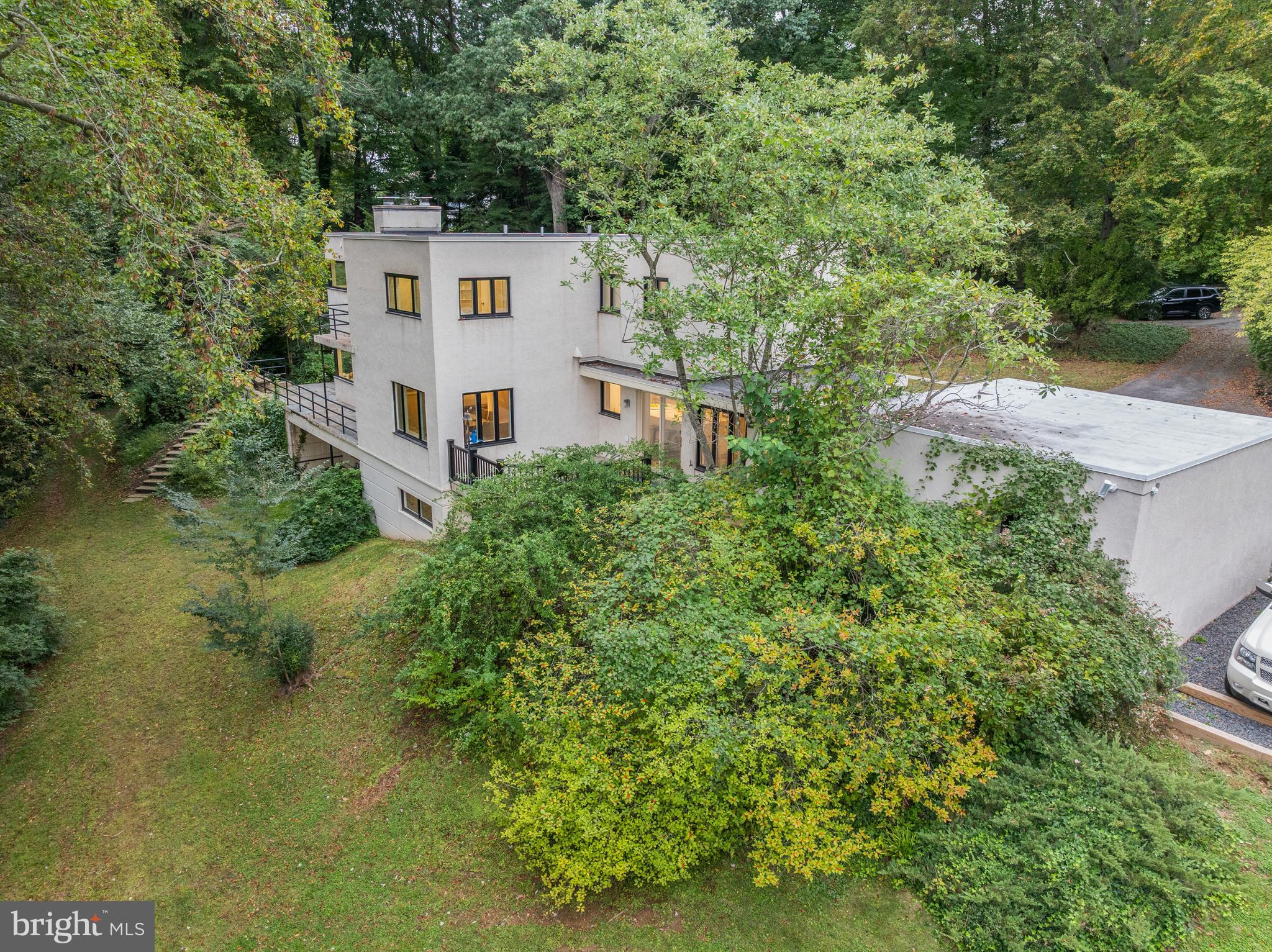 829 Black Rock Road Gladwyne, PA 19035 - Photo 14 of 20 an aerial view of a house with swimming pool and garden