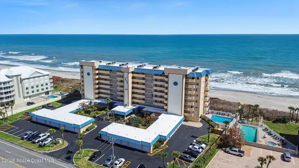 a view of a city with ocean