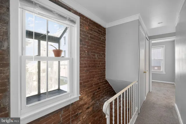 a view of entryway with stairs