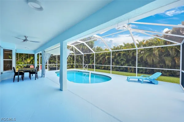 a view of a house with swimming pool