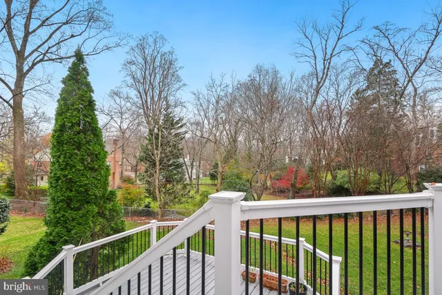 a kitchen with stainless steel appliances granite countertop a stove a refrigerator and a more cabinets