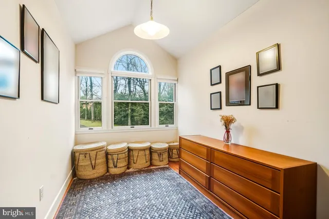 a hallway with a sink and breakfast area