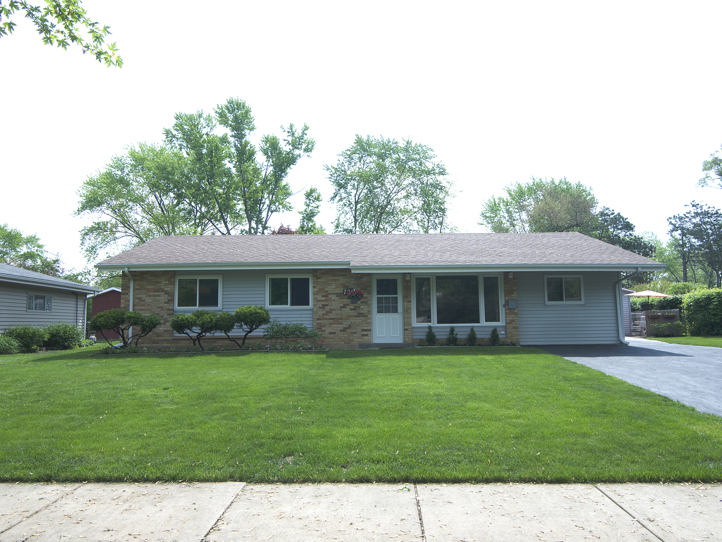 a view of a house with a garden