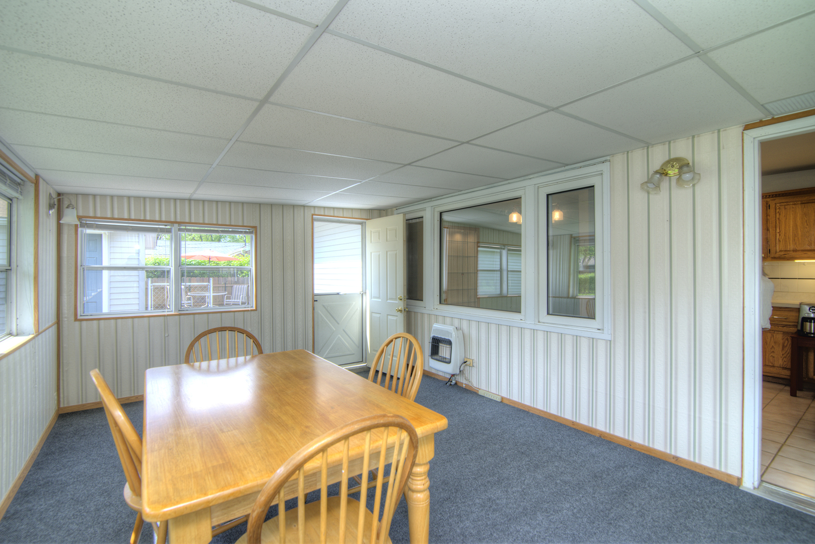 725 Washington Boulevard Hoffman Estates, IL 60169 - Photo 19 of 32 a view of a dining room with furniture and windows