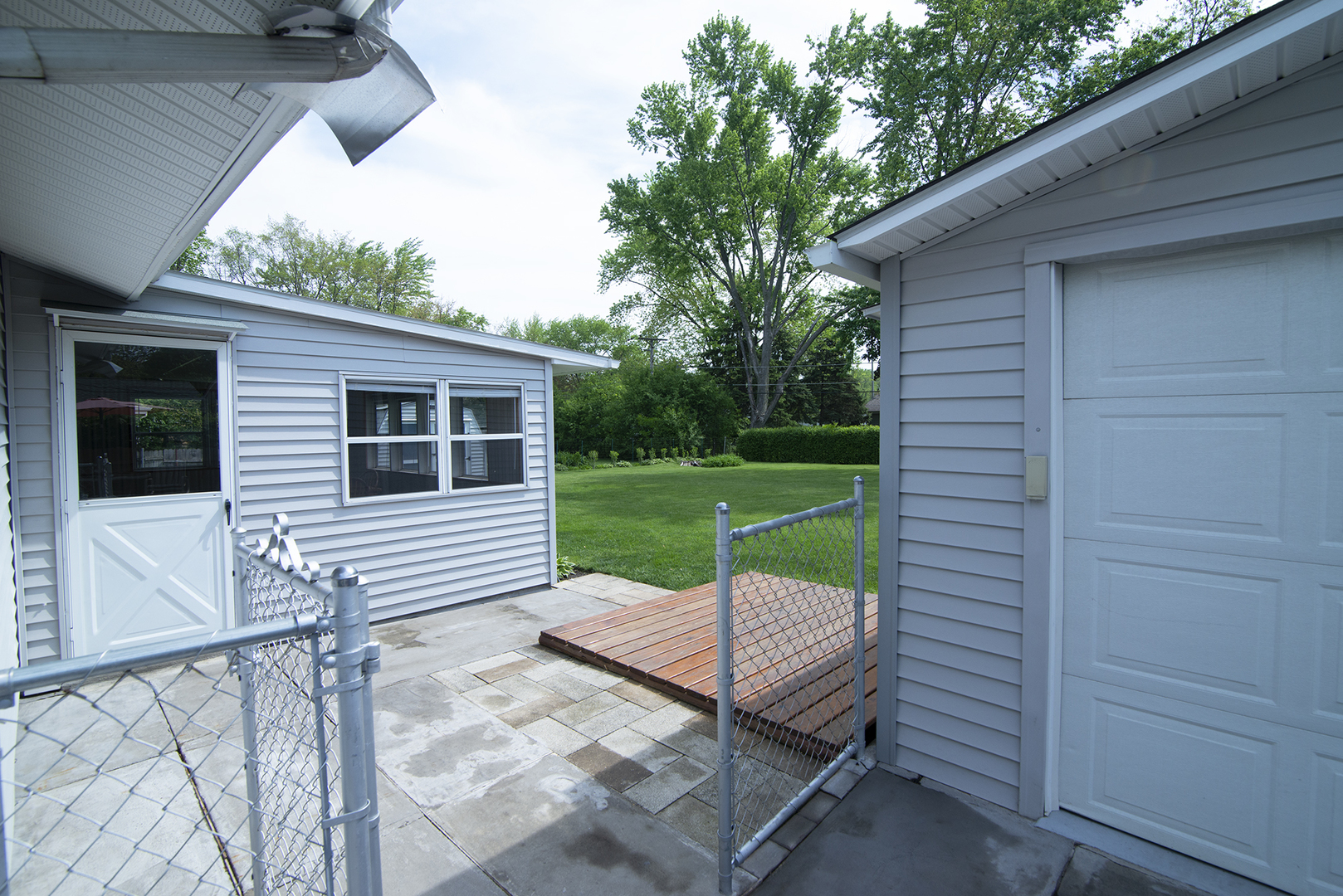 725 Washington Boulevard Hoffman Estates, IL 60169 - Photo 26 of 32 a view of a patio with a yard