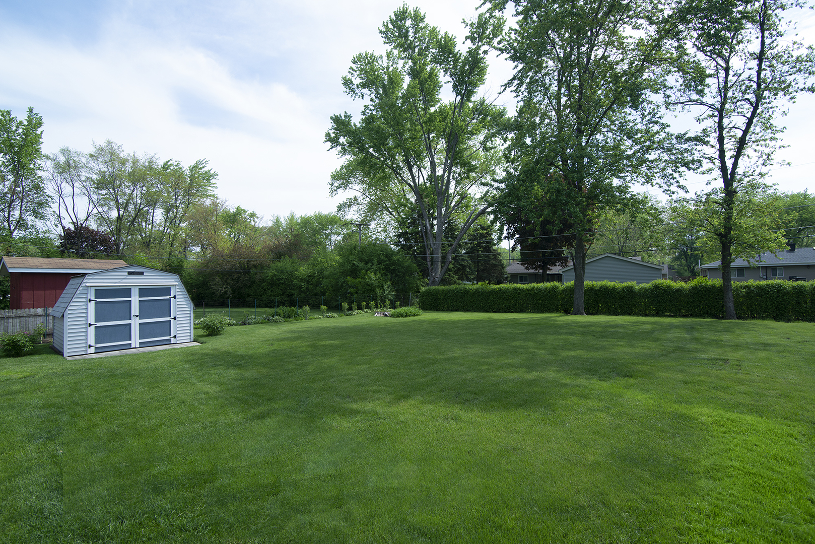 725 Washington Boulevard Hoffman Estates, IL 60169 - Photo 29 of 32 a view of a house with a yard