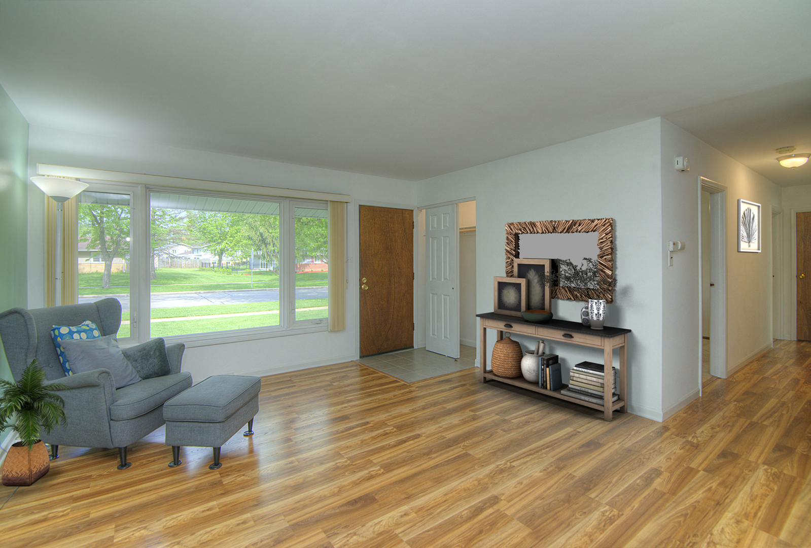 725 Washington Boulevard Hoffman Estates, IL 60169 - Photo 4 of 32 a living room with furniture and a flat screen tv