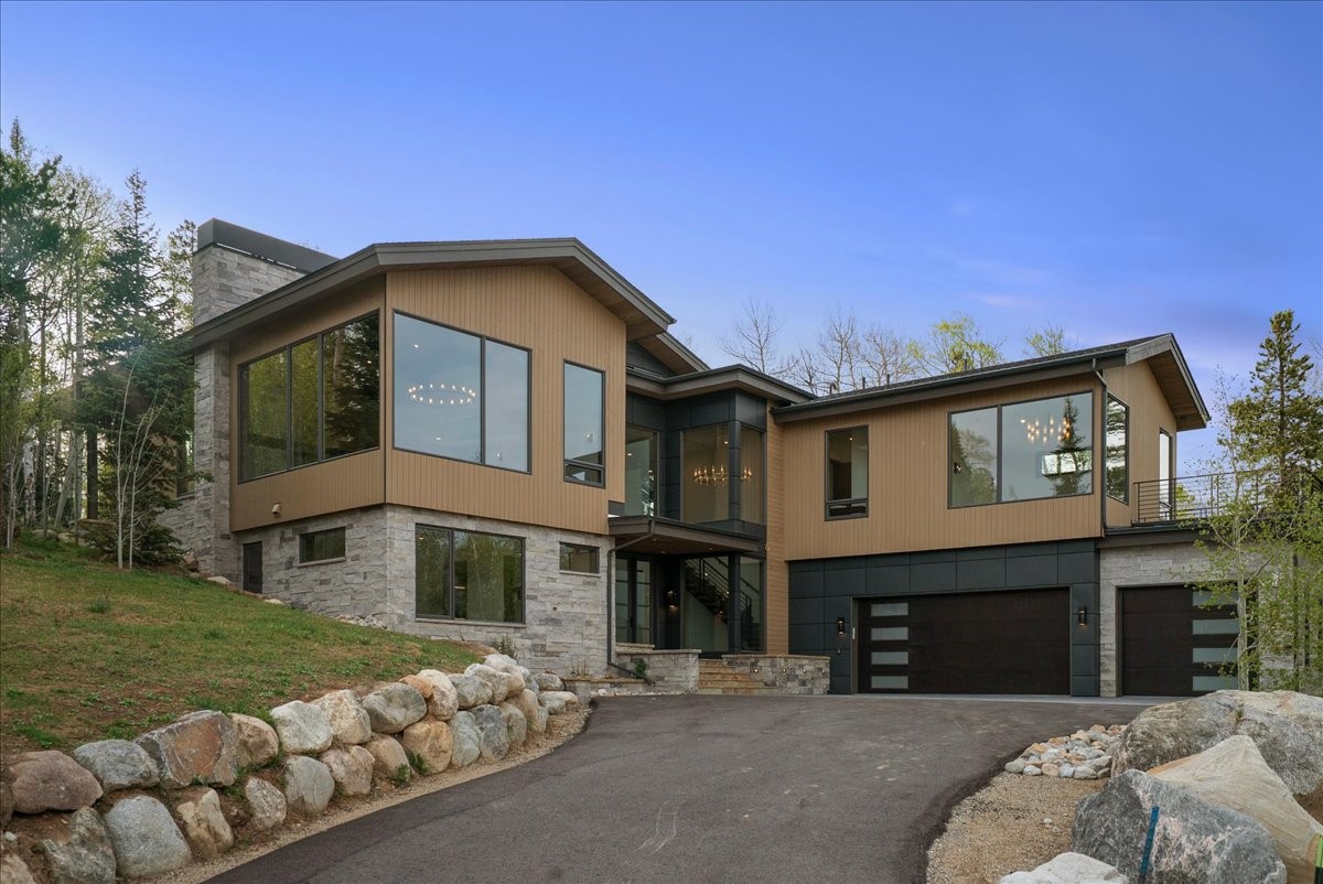 1615 Golden Eagle Road Silverthorne, CO 80498 - Photo 46 of 47 a front view of a house with a garden