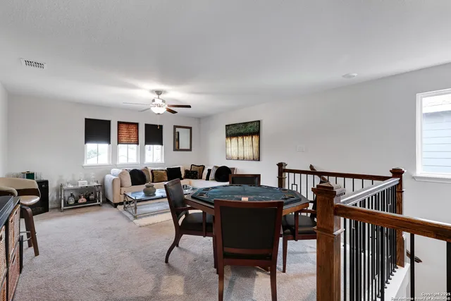a view of a livingroom with furniture and window