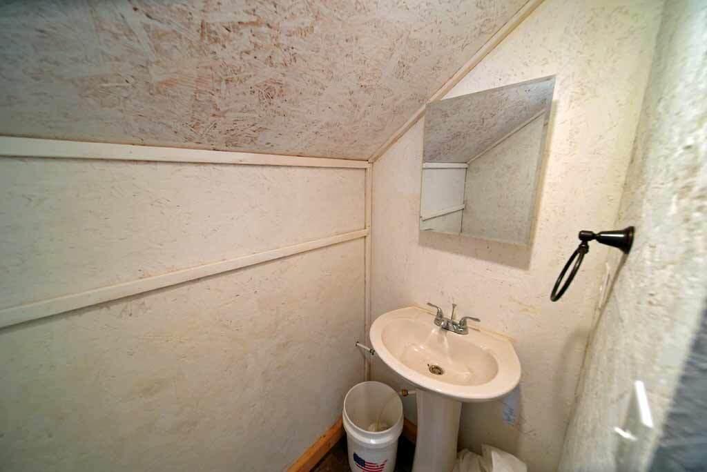 608 Number 9 Road Orient, ME 04471 - Photo 67 of 80 bathroom-started-guest-area