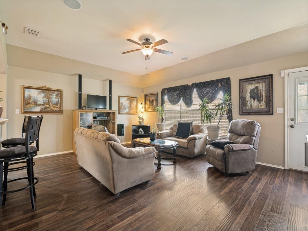 119 Robin Lane Forney, TX 75126 - Photo 6 of 27 Spacious living area featuring wood-finish flooring, a ceiling fan, and recessed lighting