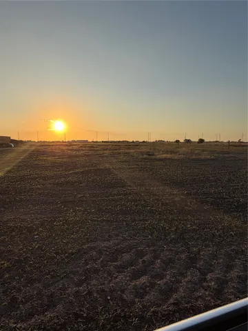 a view of an ocean beach and mountain view