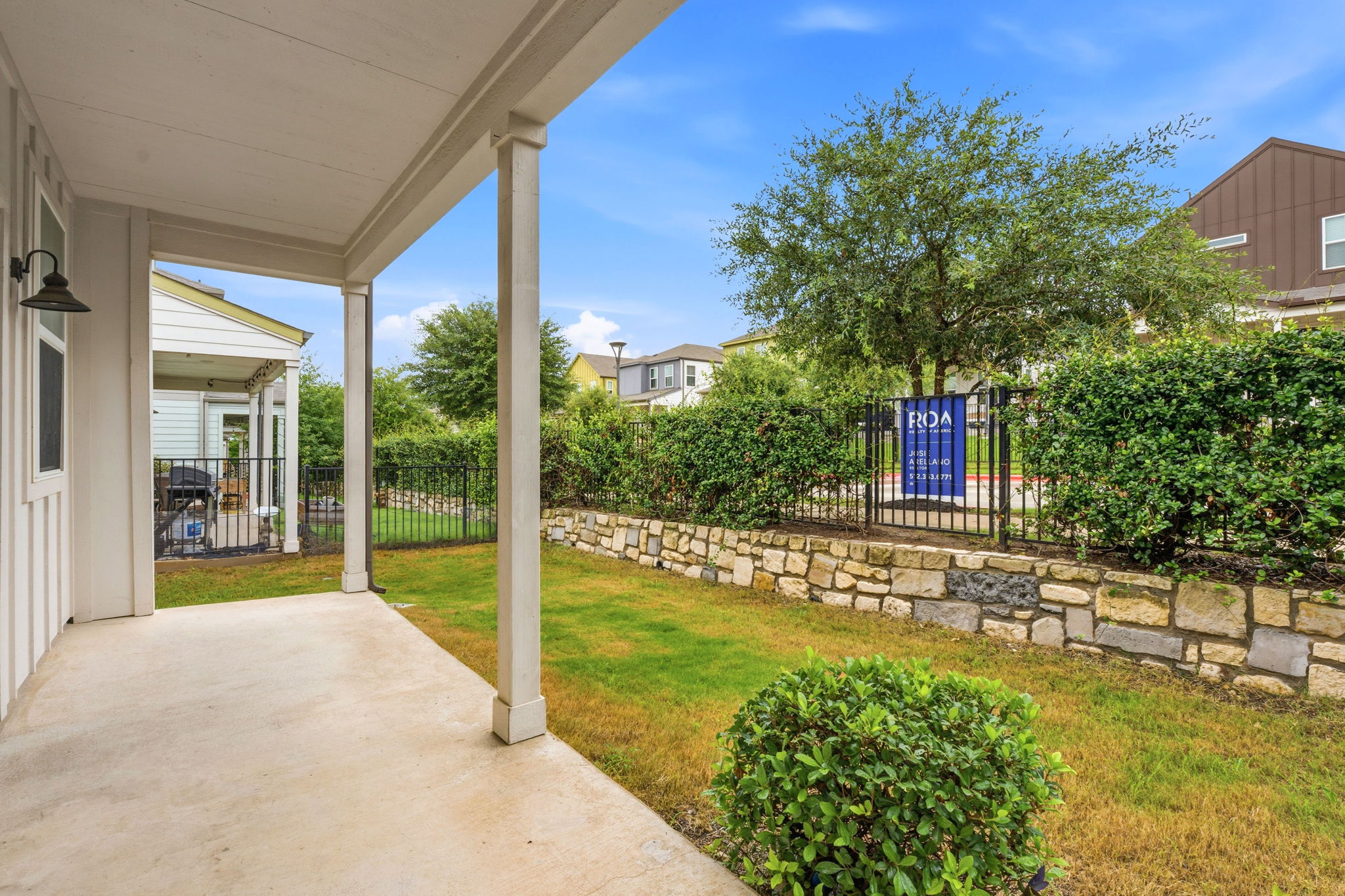7105 Silver Star Lane, Unit 59 Austin, TX 78744 - Photo 17 of 19 a view of a backyard with garden