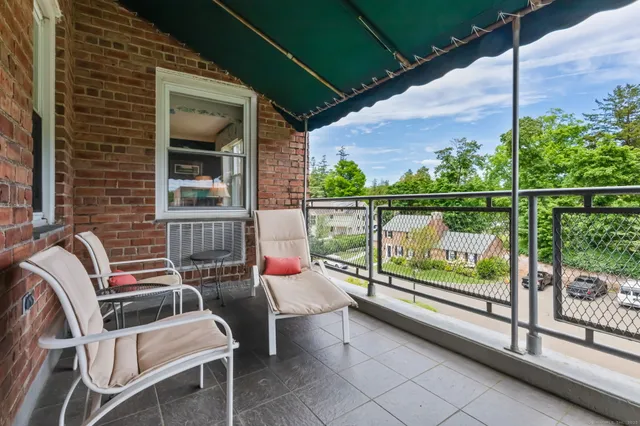 a view of parking garage with cars