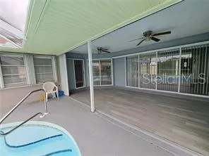 a view of room with ceiling fan