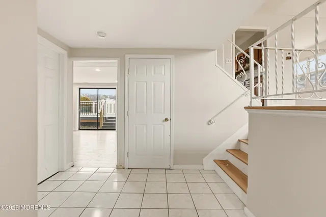 a view of an entryway with stairs