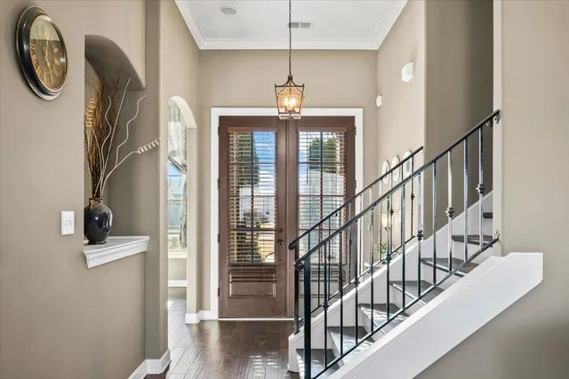 a view of entryway with wooden floor