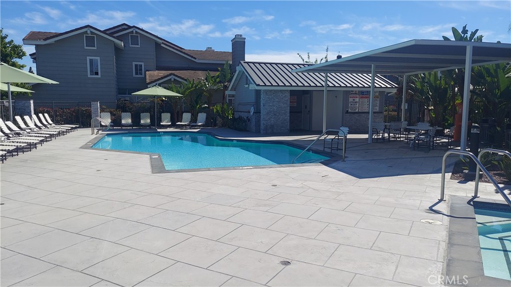 13582 Sweetshade Way Tustin, CA 92782 - Photo 12 of 12 an outdoor space with patio furniture and potted plants