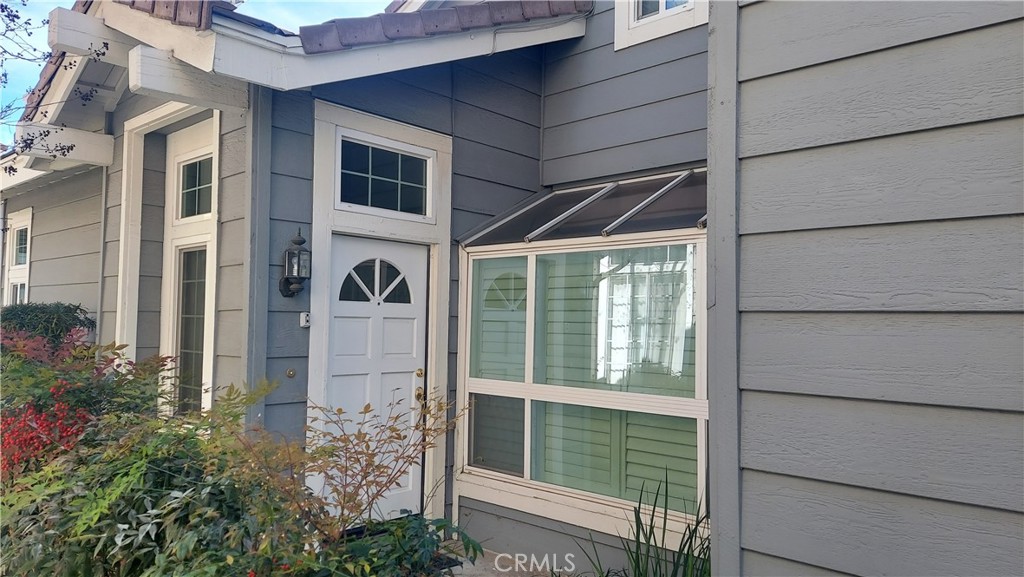 13582 Sweetshade Way Tustin, CA 92782 - Photo 3 of 12 a view of a door of the house