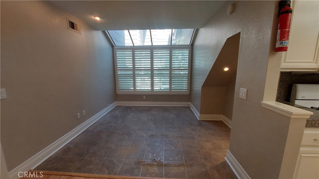 13582 Sweetshade Way Tustin, CA 92782 - Photo 6 of 12 a view of a room with windows