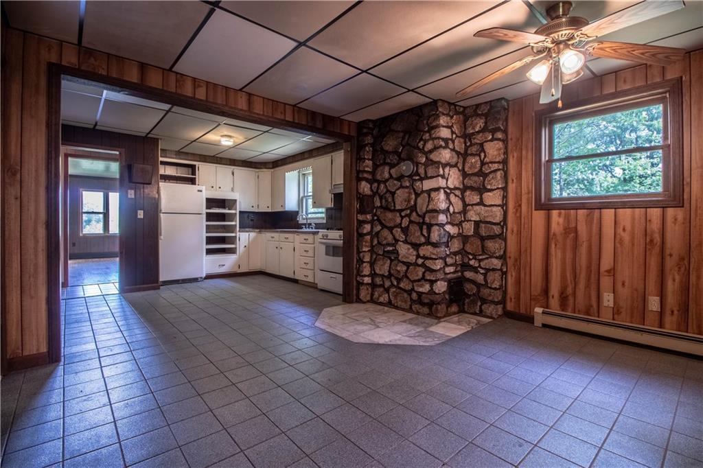 106 Robinson Hill Road Sebago, ME 04029 - Photo 14 of 34 Tiled dining area, kitchen, with...