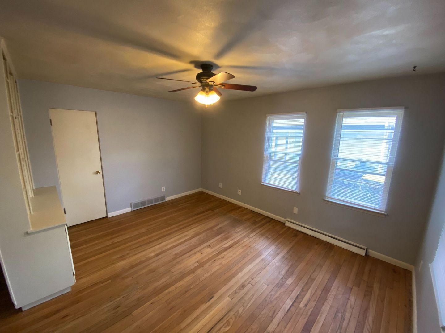 1011 Franklin Avenue Normal, IL 61761 - Photo 10 of 15 a view of empty room with wooden floor and fan