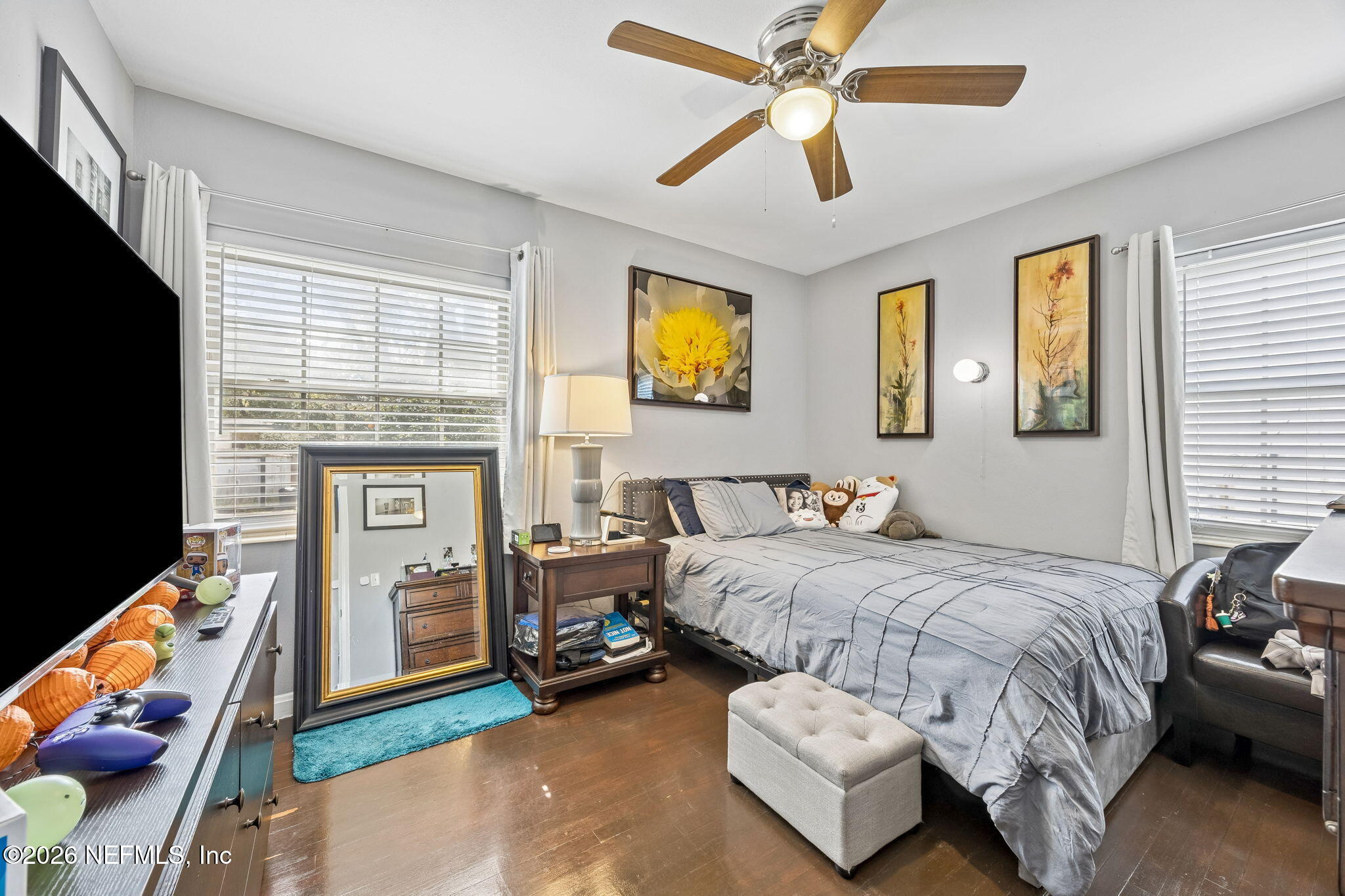 7022 Gaillardia Road South Jacksonville, FL 32211 - Photo 17 of 32 a bedroom with a bed and a couch