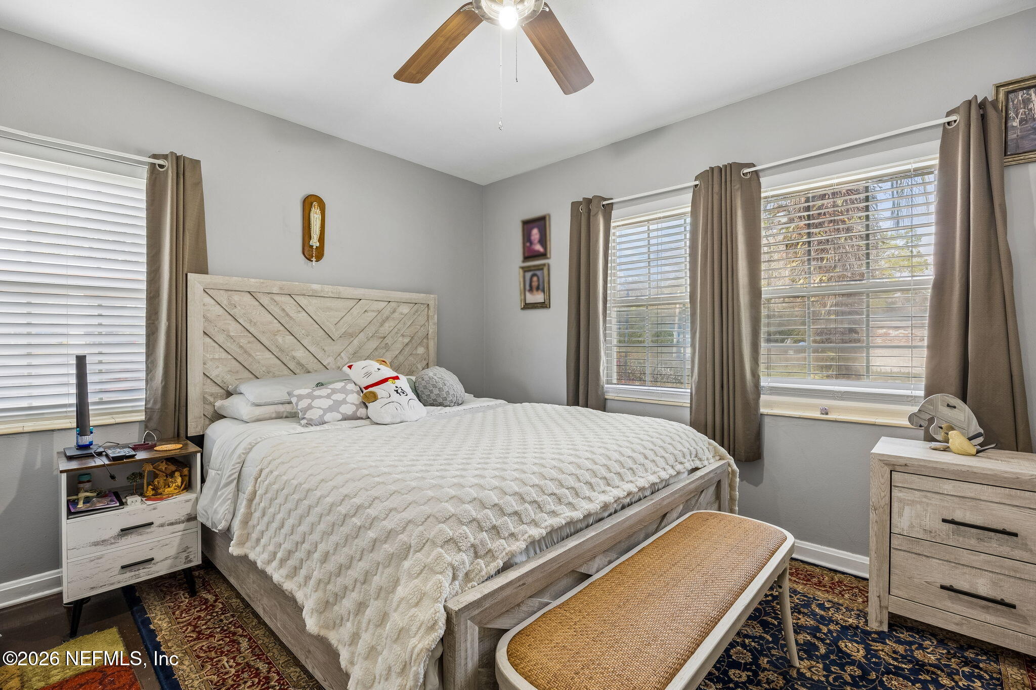 7022 Gaillardia Road South Jacksonville, FL 32211 - Photo 19 of 32 a bedroom with a bed and a window