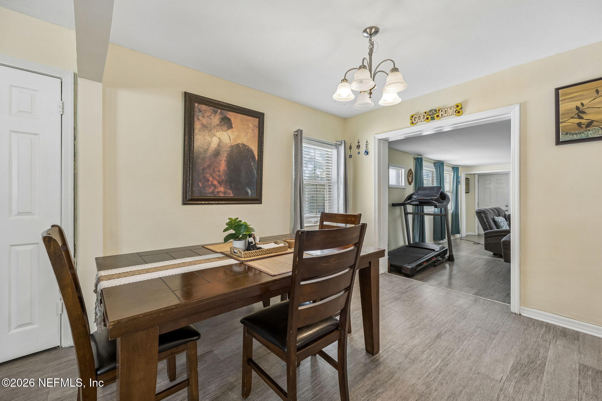 7022 Gaillardia Road South Jacksonville, FL 32211 - Photo 8 of 32 a view of a dining room with furniture and wooden floor