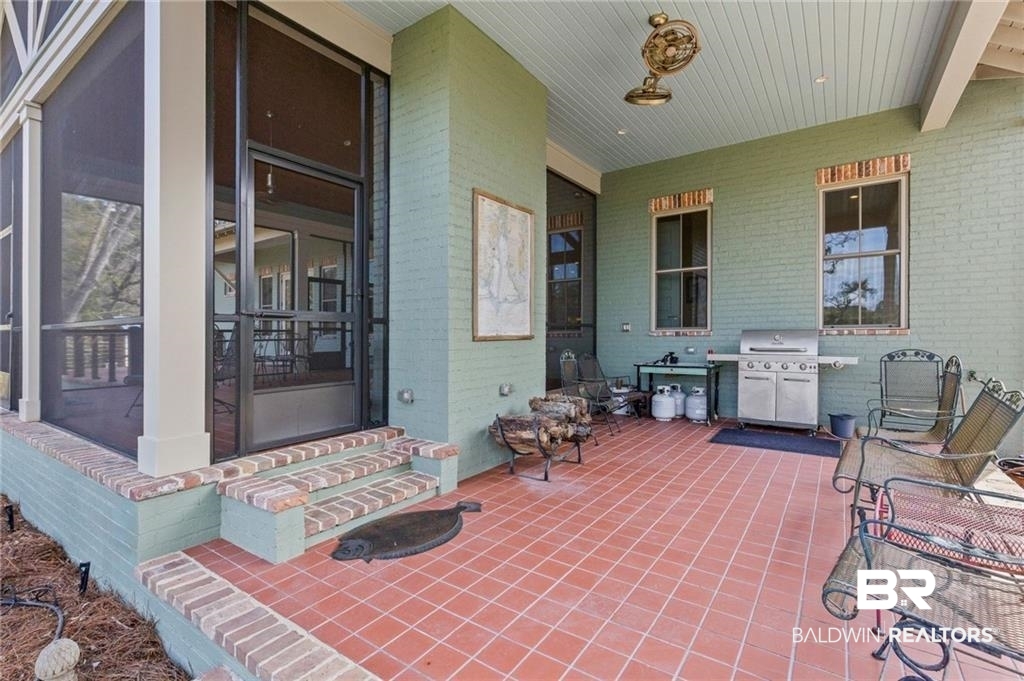 2730 Gator Road Mobile, AL 36605 - Photo 7 of 42 View of patio / terrace featuring a grill