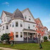 a front view of a house with garden