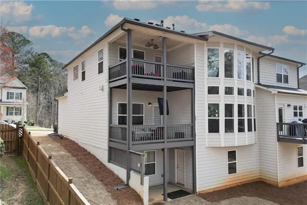 an aerial view of a house with swimming pool