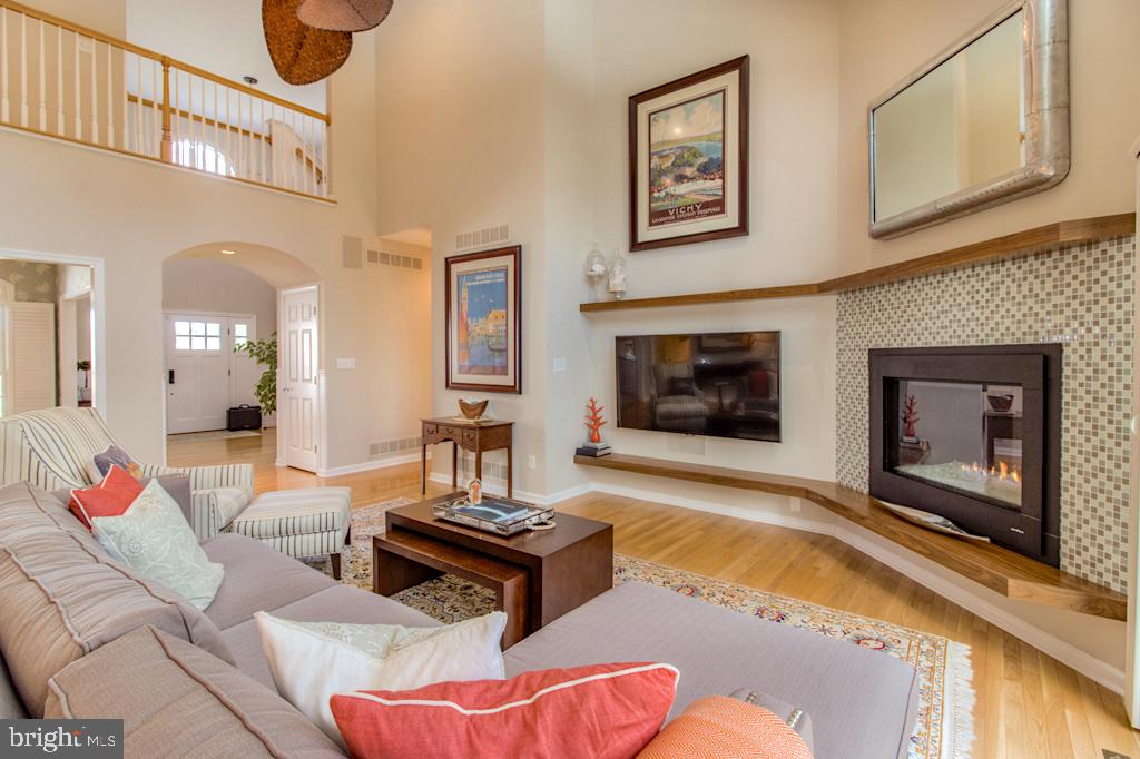 105 Brighton Road Rehoboth Beach, DE 19971 - Photo 4 of 50 Custom floating beams and modern, gas fireplace