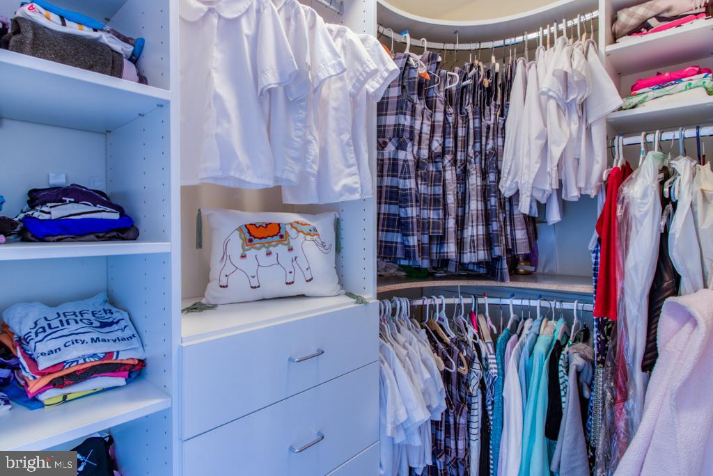 105 Brighton Road Rehoboth Beach, DE 19971 - Photo 33 of 50 Guest room #3 walk-in closet with custom shelving