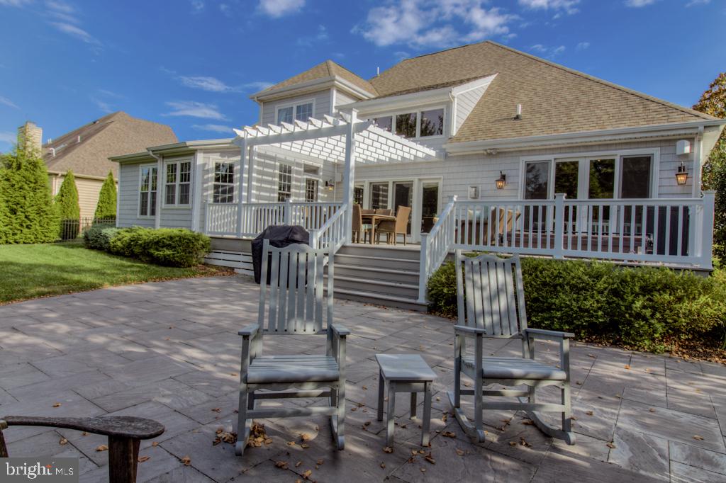 105 Brighton Road Rehoboth Beach, DE 19971 - Photo 45 of 50 Paver patio with custom fire place