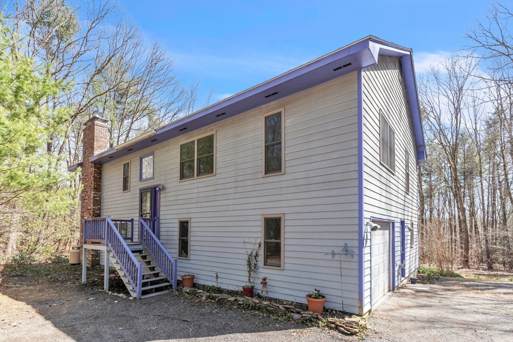 213 North Valley Road Pelham, MA 01002 - Photo 3 of 42 a view of a house with a yard