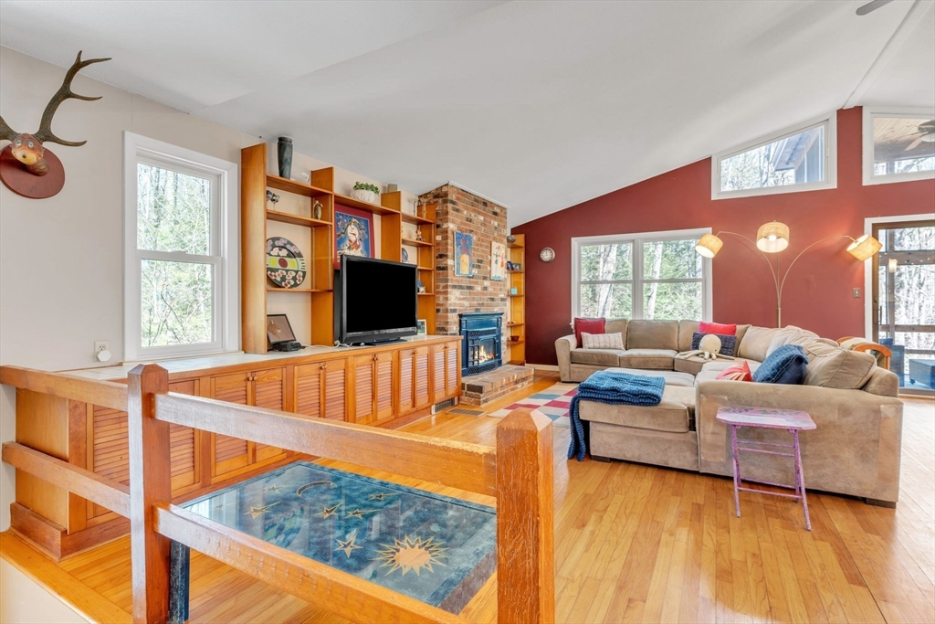 213 North Valley Road Pelham, MA 01002 - Photo 4 of 42 a living room with furniture a rug and a window