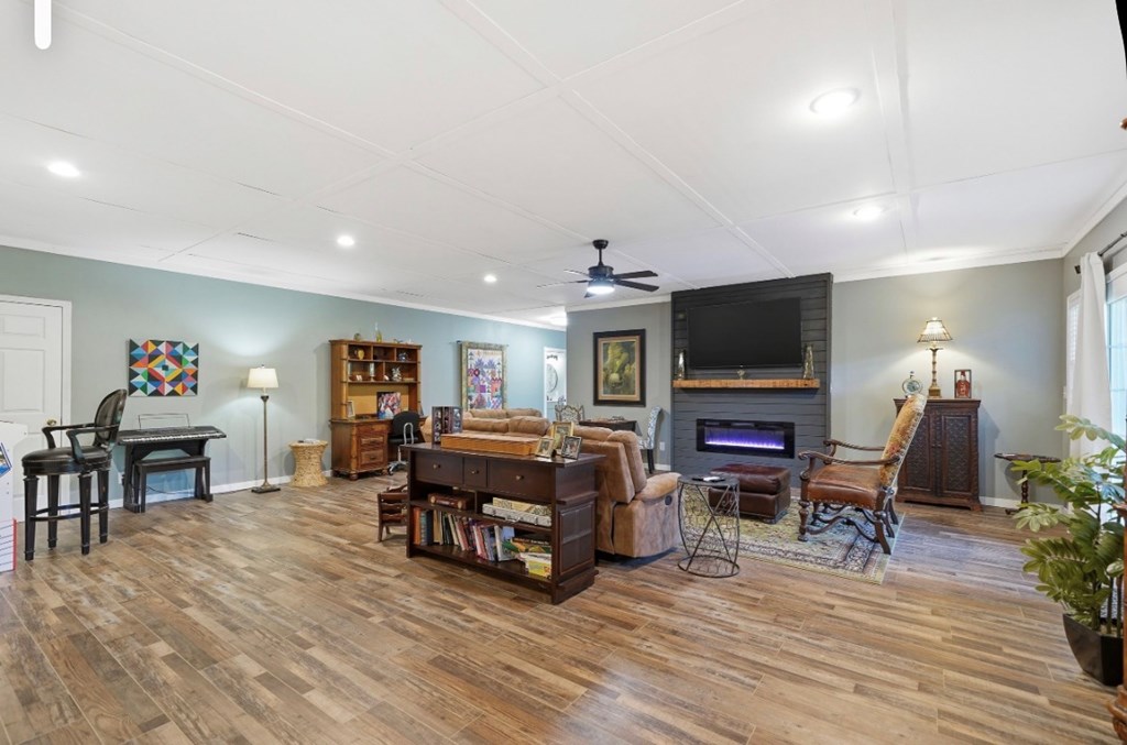 178 Windy Valley Lane Blue Ridge, GA 30513 - Photo 6 of 37 a living room with furniture and a flat screen tv