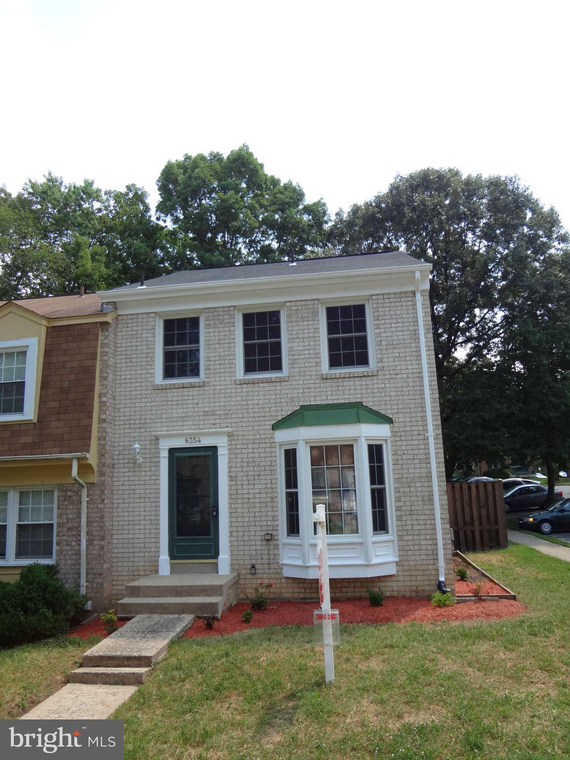6354 Draco Street Burke, VA 22015 - Photo 19 of 21 a front view of house with yard