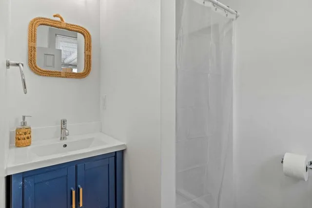 a bed room with a bed and a television