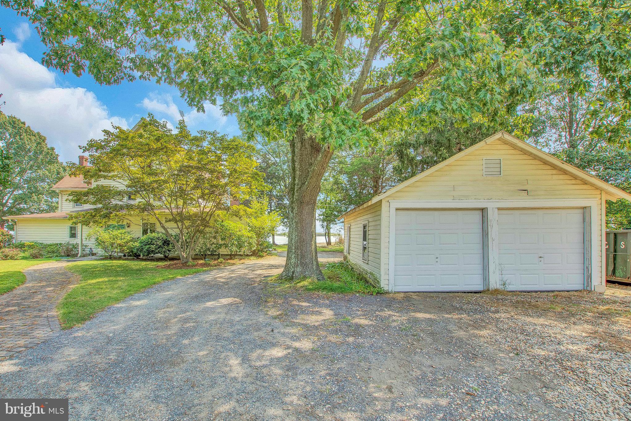 5773 Blaine Road Churchton, MD 20733 - Photo 4 of 30 LARGE GRAVEL DRIVEWAY & GARAGE
