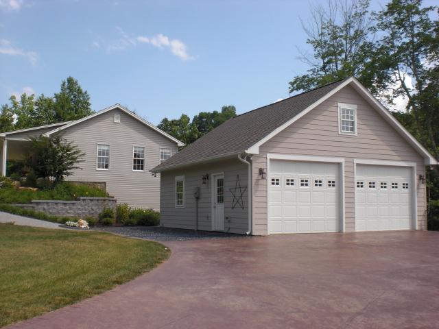 1063 Madcap Road Rocky Mount, VA 24151 - Photo 2 of 39 a view of an house with backyard and garden