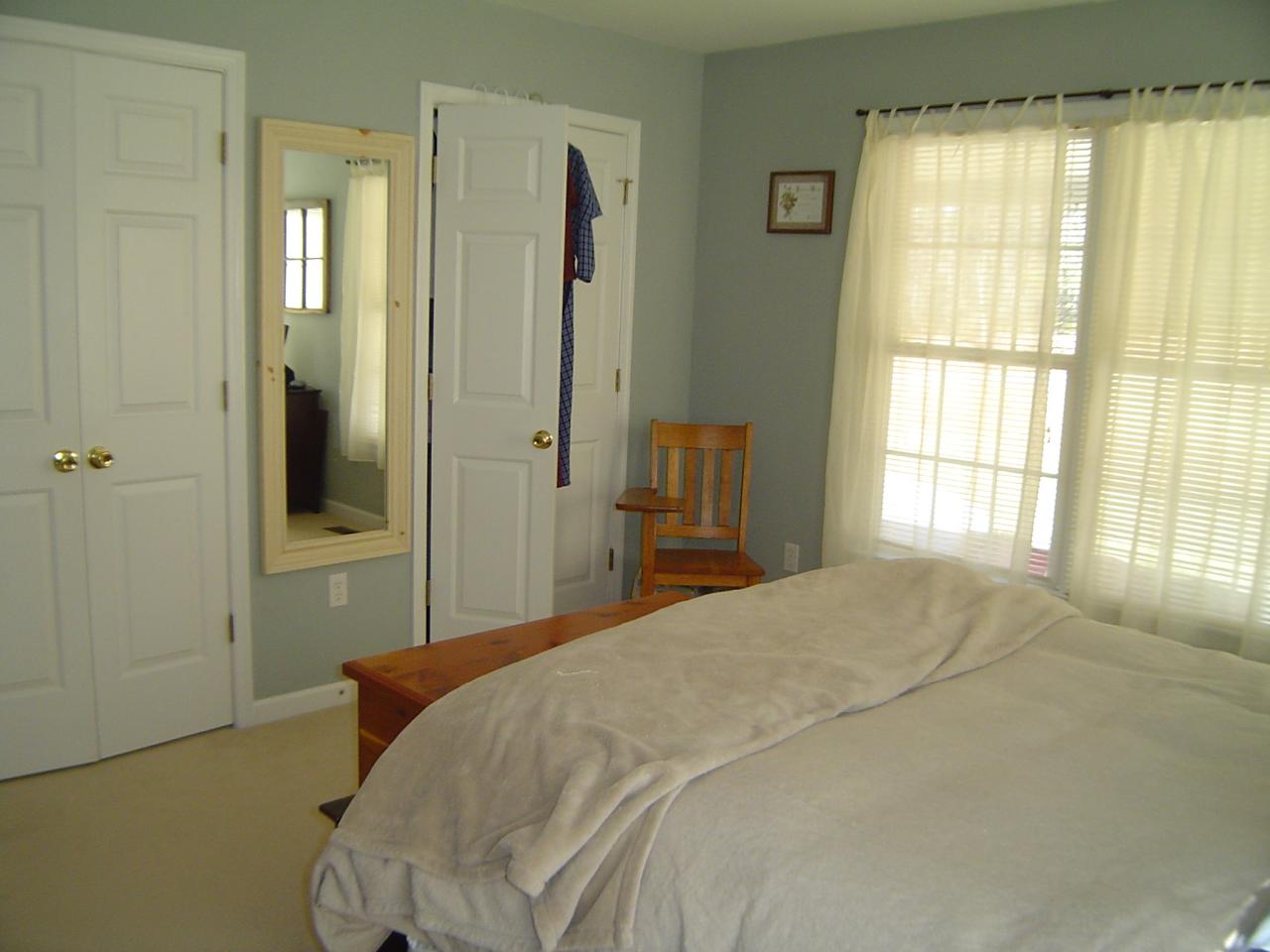 1063 Madcap Road Rocky Mount, VA 24151 - Photo 12 of 39 a bedroom with a bed and a window