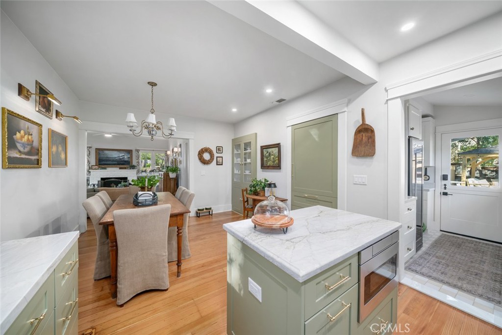 135 18th Street Paso Robles, CA 93446 - Photo 11 of 45 a view of a dining room with furniture and chandelier