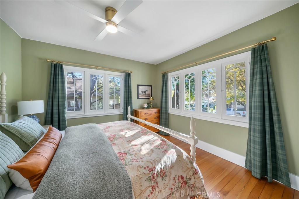 135 18th Street Paso Robles, CA 93446 - Photo 24 of 45 a spacious bedroom with a large bed and a large window