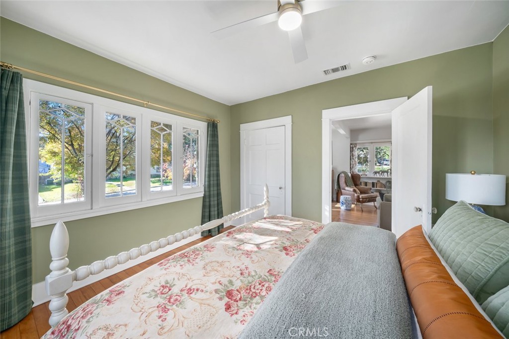 135 18th Street Paso Robles, CA 93446 - Photo 25 of 45 a bedroom with a large bed and a large window