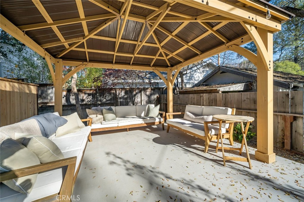 135 18th Street Paso Robles, CA 93446 - Photo 28 of 45 a view of a patio with a table and chairs