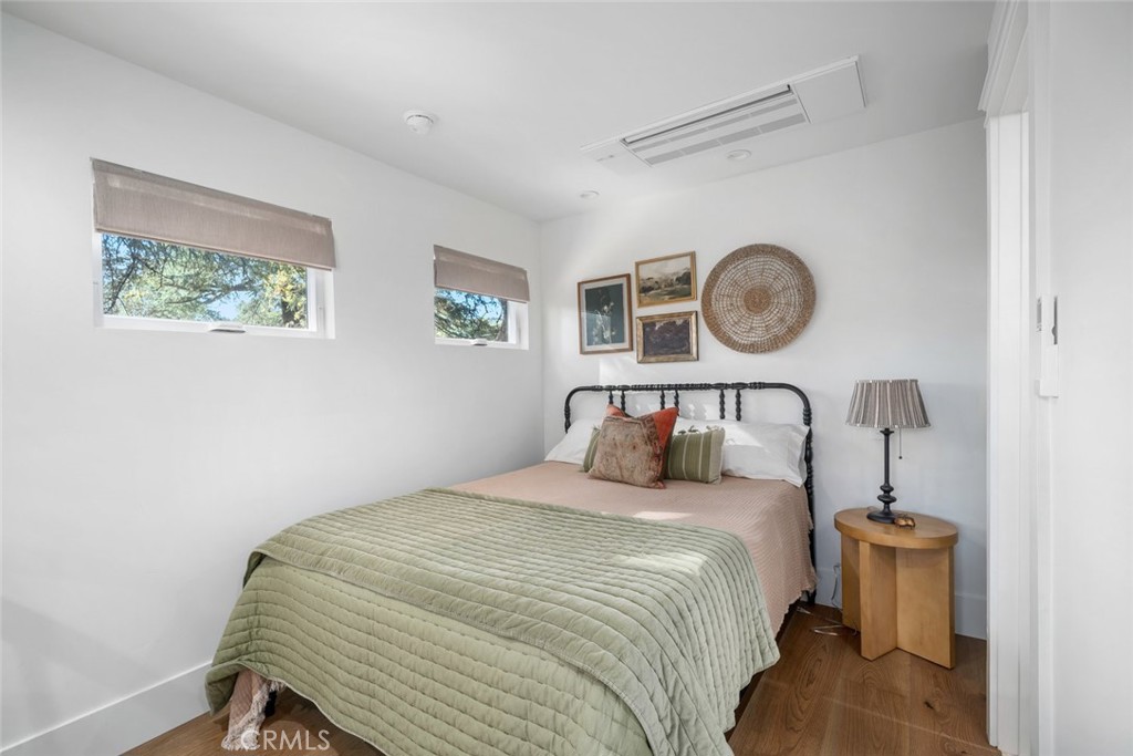 135 18th Street Paso Robles, CA 93446 - Photo 36 of 45 a bedroom with a bed and a window