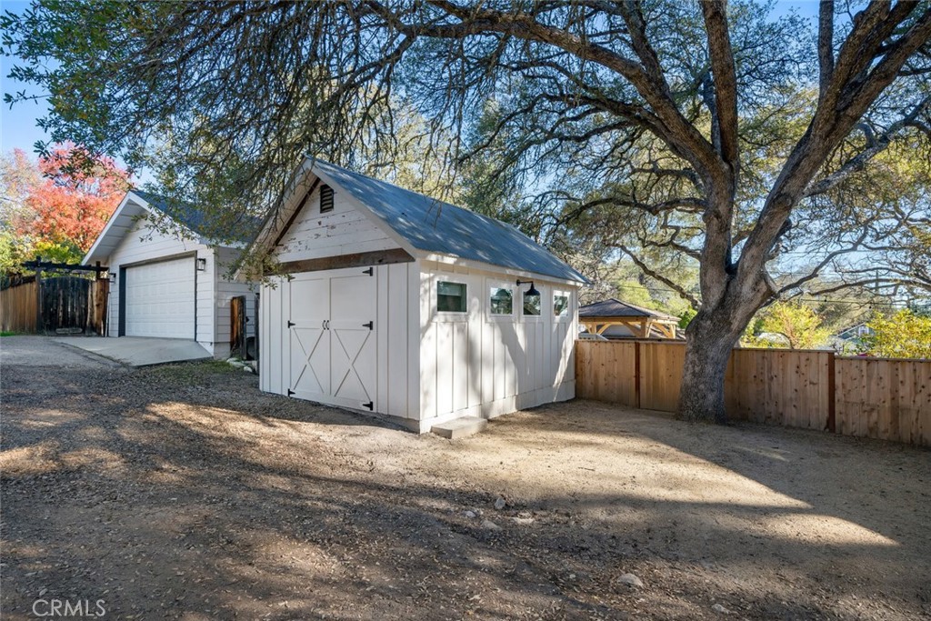 135 18th Street Paso Robles, CA 93446 - Photo 41 of 45 a front view of house with yard and trees