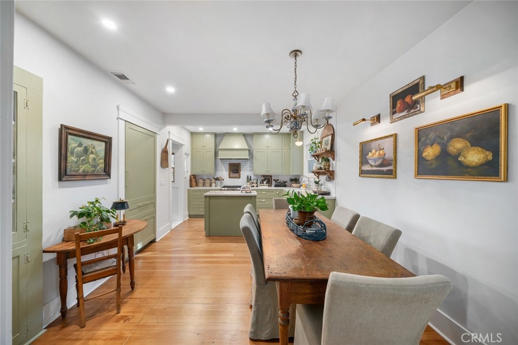 135 18th Street Paso Robles, CA 93446 - Photo 6 of 45 a view of a dining room with furniture and chandelier